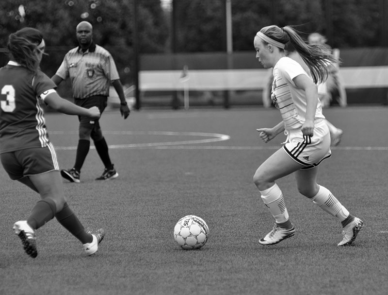 Madison College freshman Kaitlin Satern, right, moves in to steal the ball from an opponent during a home game on Sept. 7