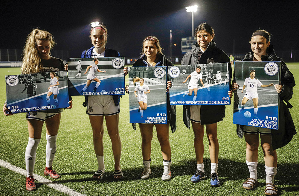 Sophomores on the Madison College women’s soccer team hold the framed photos they were give prior to their final match. Pictured, from left, are Peyton Trapino, Britt Schumann, Esther Noriega, Cintia Temozihui Zecua, and Autumn Petroski.