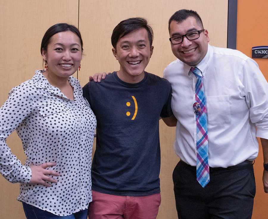 Speaker Neng Thoa, center, joins conference organizers Mai Xiong, left, and Ro Encizo, right, for a picture in Madison College’s Intercultural Exchange.