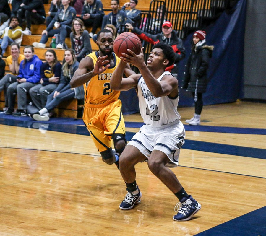 Madison College men’s basketball player DeAngelo Jones sets up for a shot against Rochester Community College on Nov. 20.