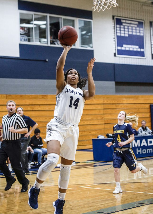 Sophomore guard Tianna Sackett drives in for a layup during the Madison College women’s basketball win over Rochester Community College on Nov. 20.