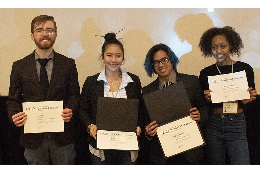 Clarion staff members, from left, Sean Bull, Tessa Morhardt, Andrew Kicmol and Amara Gobermann show awards they won