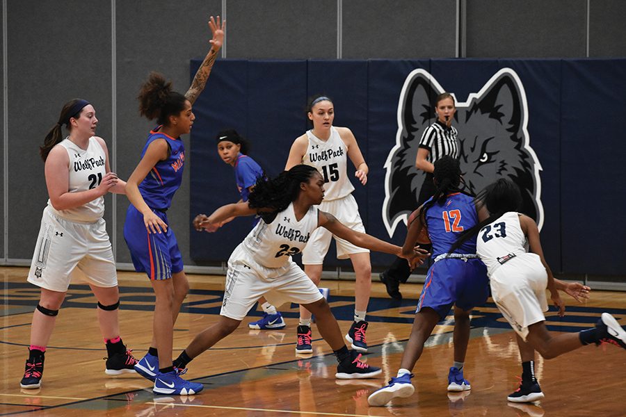 Madison College guard Shaquita Lee, 22, attempts to steal the ball from a Milwaukee Area Technical College opponent during her team’s 78-49 victory at home on Feb. 16