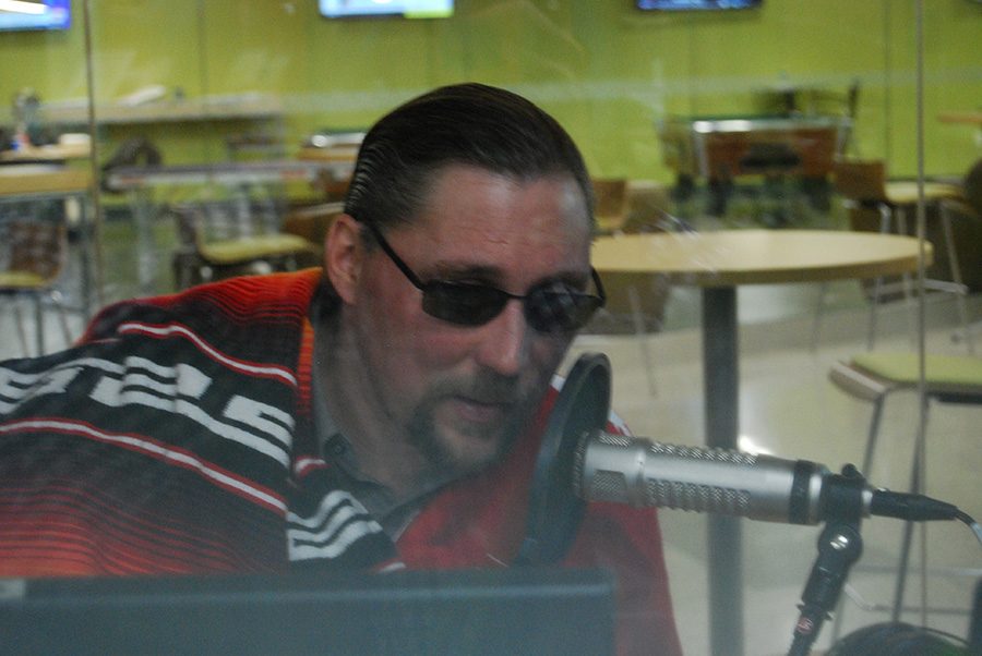 Britton Downing as Robero Domingo for his Spanish show, fills the airwaves of Clarion Radio