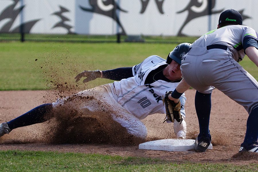 Madison College’s Walker Jenkins (10) reaches around the tag as he slides into second base during his team’s 6-5 win over the College of Lake County on April 16.