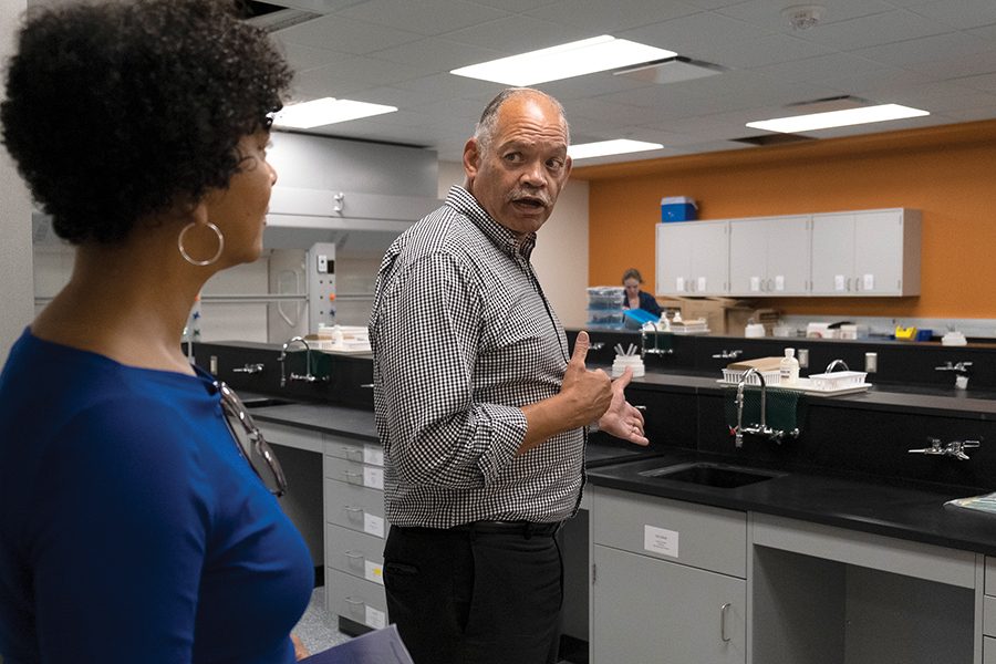 Madison College President Dr. Jack Daniels shows guests a science lab at the new Goodman South Campus on Aug. 23.