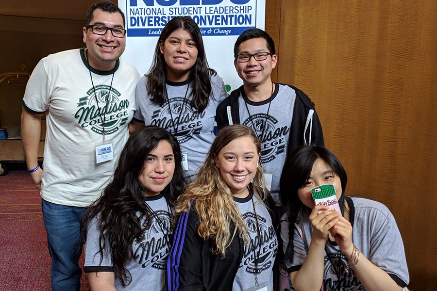 Deyshia Kinsey, front row, center, joins members of the United Common Ground for a photo at a conference last spring. Kinsey enters her second year as president of the student organization.