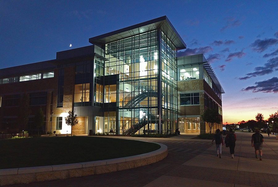 The setting sun makes for a picturesque setting behind the Health Education Building at the end of the first day of classes on Sept. 3.