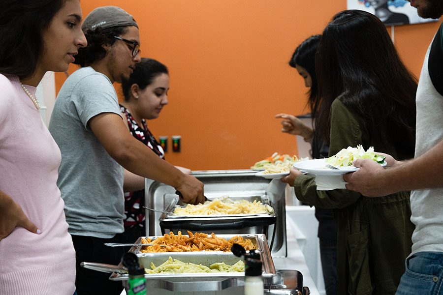 Members of United Common Ground served meals to Intercultural Exchange guests on Sept. 9.