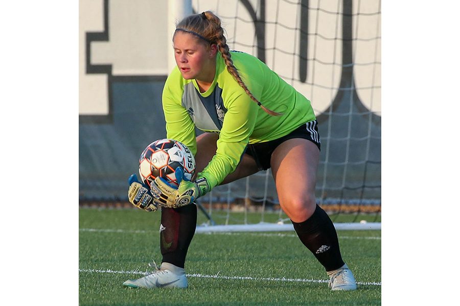 Madison College goalie Kelly Kubrick makes a save during a recent match. Kubrick has tied a school record with 12 career shutouts.