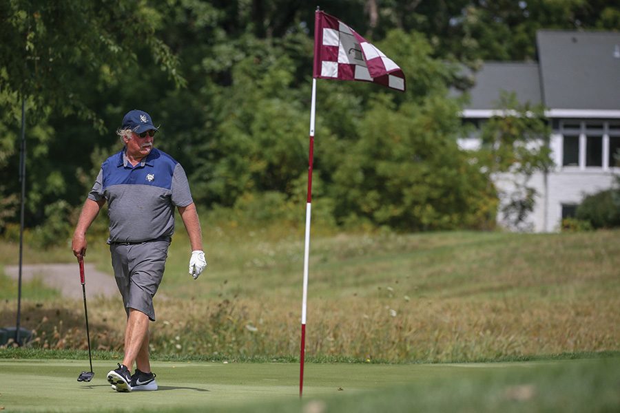 Madison College golf team captain Joe Ignatius approaches the green during a recent meet.