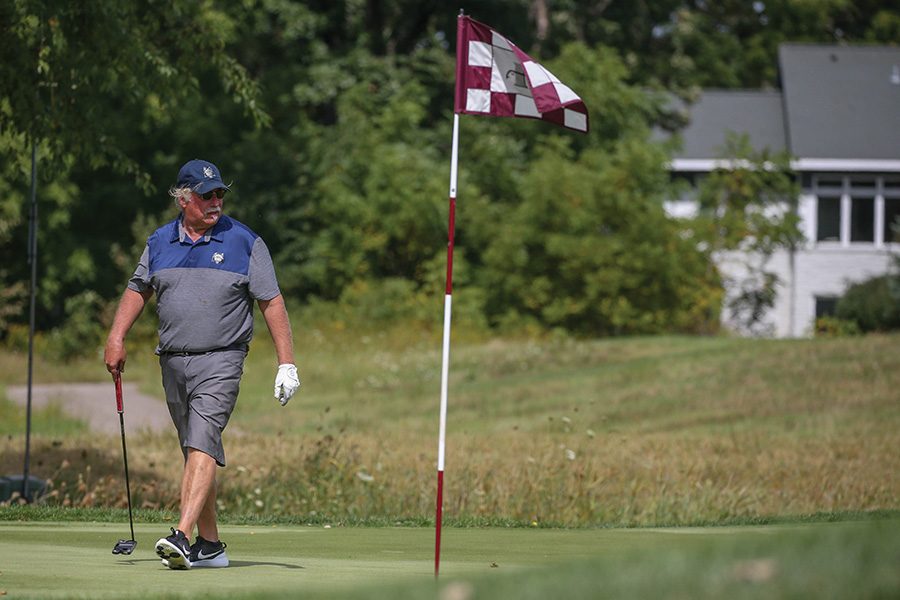 Madison+College+golf+team+captain+Joe+Ignatius+approaches+the+green+during+a+recent+meet.