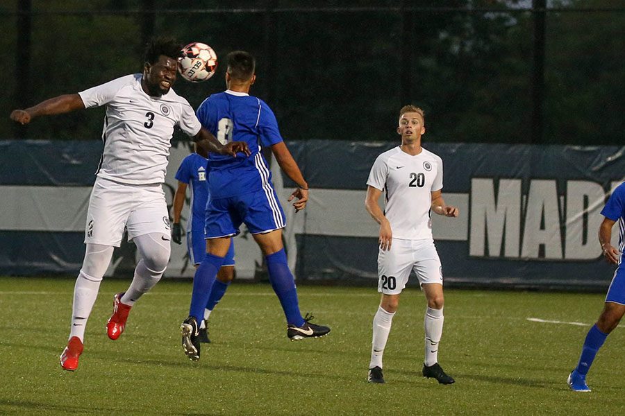 Madison College men’s soccer player Muhammed Sallah (3) heads the ball away from an opponent during a recent match at Goodman Pitch East.