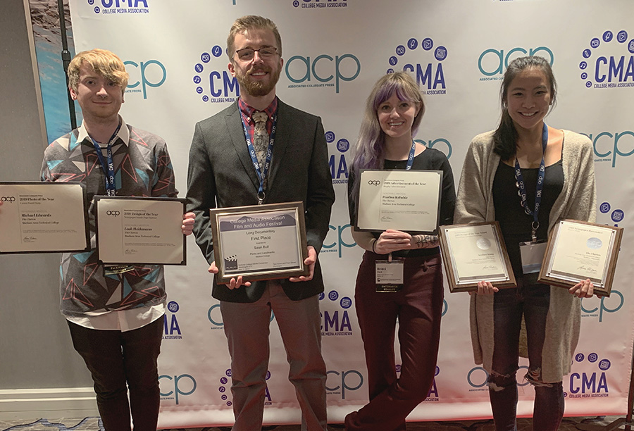 The Clarion staff members attended the Associated Collegiate Press National College Media Convention in Washington, D.C., on Oct. 31 through Nov. 3. Pictured, from left, are Chris Bird, Sean Bull, Britni Petitt, and Tessa Morhardt, showing some of the awards the newspaper earned.