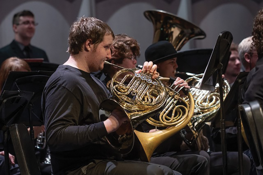 The Madison College municipal band rehearses for an upcoming concert to be held at Madison College’s Mitby Theater on Dec. 6. at 7:30 p.m. The group will be joined by the college’s big band and jazz ensemble.