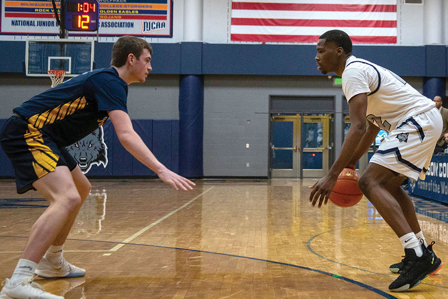 Madison College’s Shamar Newman, right, prepares to drive past a Rock Valley College defender during a recent game.