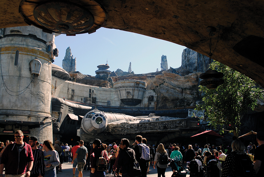 The Millennium Falcon sits parked outside the outpost, which houses the Smuggler’s Run ride inside Star Wars: Galaxy’s Edge at Walt Disney World in Orlando, Florida.