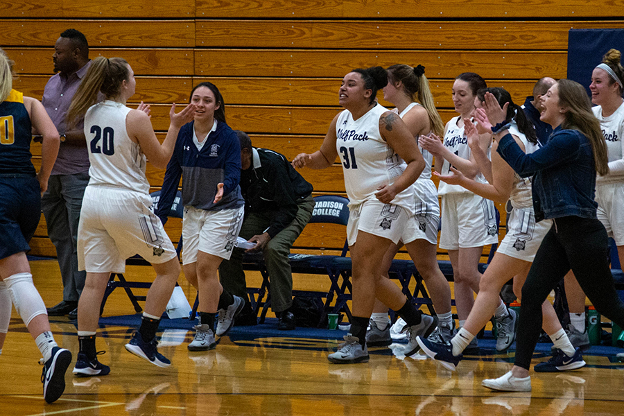 Madison College’s Amber Sue Udelhoven his greeted by her teammates after hitting a basket against Rock Valley College on Jan. 4.