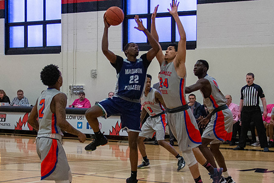 Madison College's Shamar Newman goes up for a shot against Milwaukee Area Technical College on Feb. 15.
