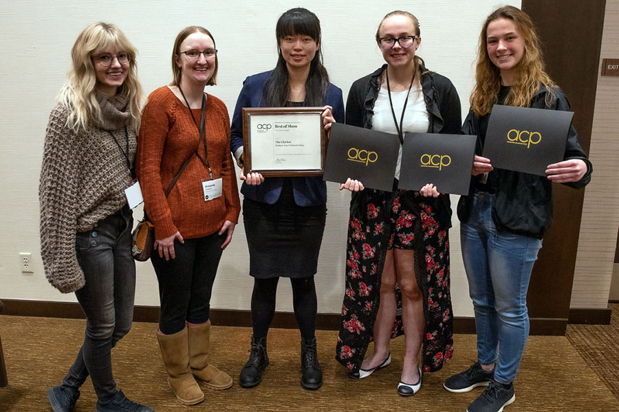 Members+of+The+Clarion+staff+show+awards+the+paper+received+at+the+Best+of+the+Midwest+College+Journalism+Conference.+Pictured%2C+from+left%2C+are%3A+Britni+Petitt%2C+Mandy+Scheuer%2C+Maia+Lathrop%2C+Christina+Gordon+and+Anica+Graney.