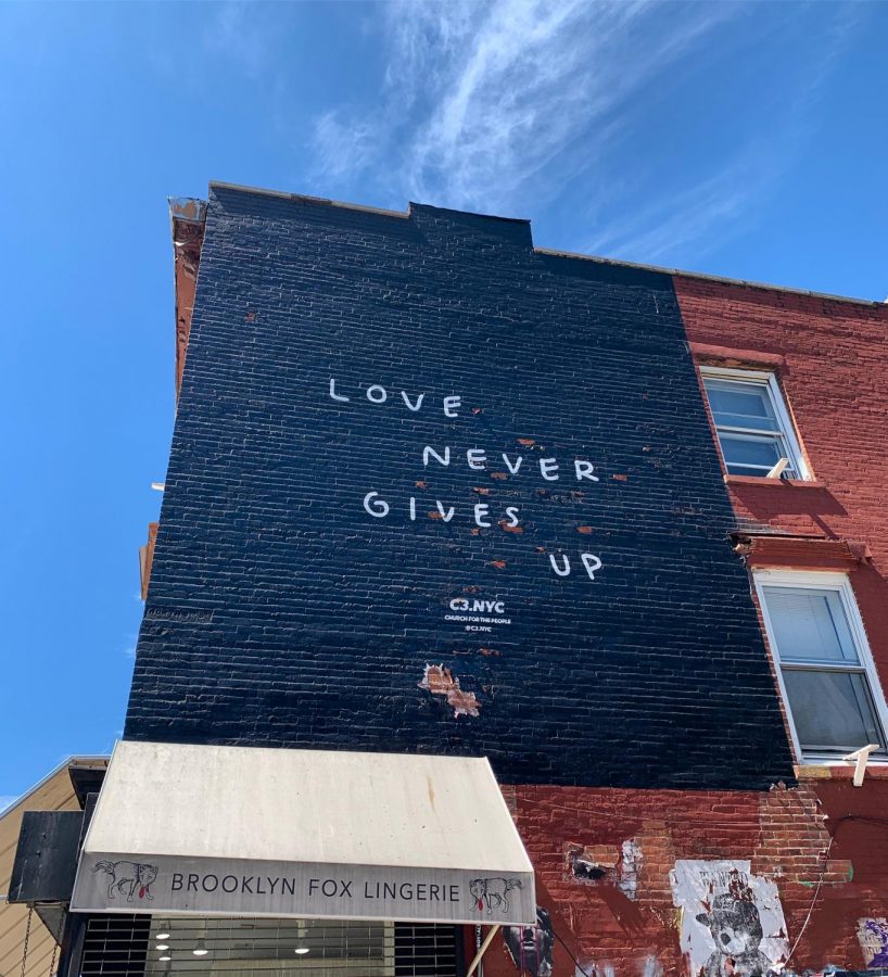 A mural on a wall in Brooklyn, N.Y., reminds people of the importance of love.