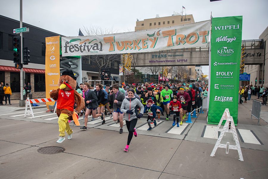 Runners+start+the+Festival+Foods+Turkey+Trot+in+2019+in+Madison.+This+year%2C+runners+will+participate+from+home.