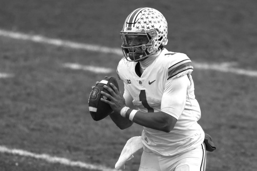 Ohio State quarterback Justin Fields looks to pass in the second half against Michigan State at Spartan Stadium in East Lansing, Michigan, on Saturday, Dec. 5, 2020. Ohio State won, 52-12.