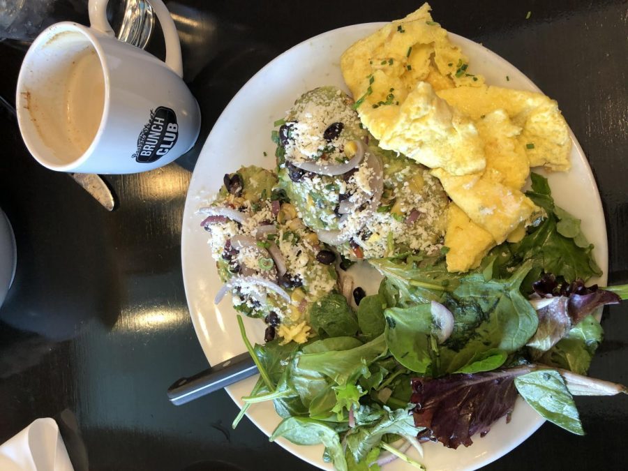 The Toastest with the Mostest with scrambled eggs and mixed greens from Bassett Street Brunch Club.