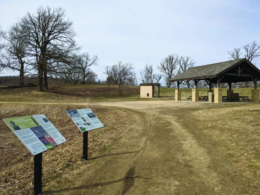 Park shelter and information signs at Donald County Park.