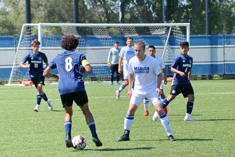 Madison Colleges Jonas Luskey Sanders, 8, looks to get past a defender during a recent scrimmage.