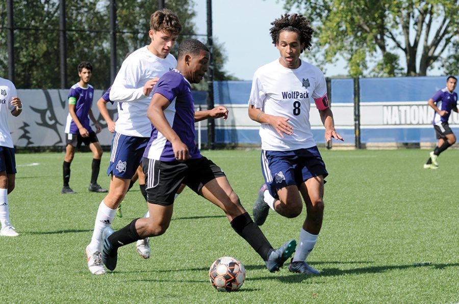 Madison College’s Jonas Luskey Sanders, right, scored three goals against Joliet Junior College in his team’s 6-0 victory on Sept. 25.