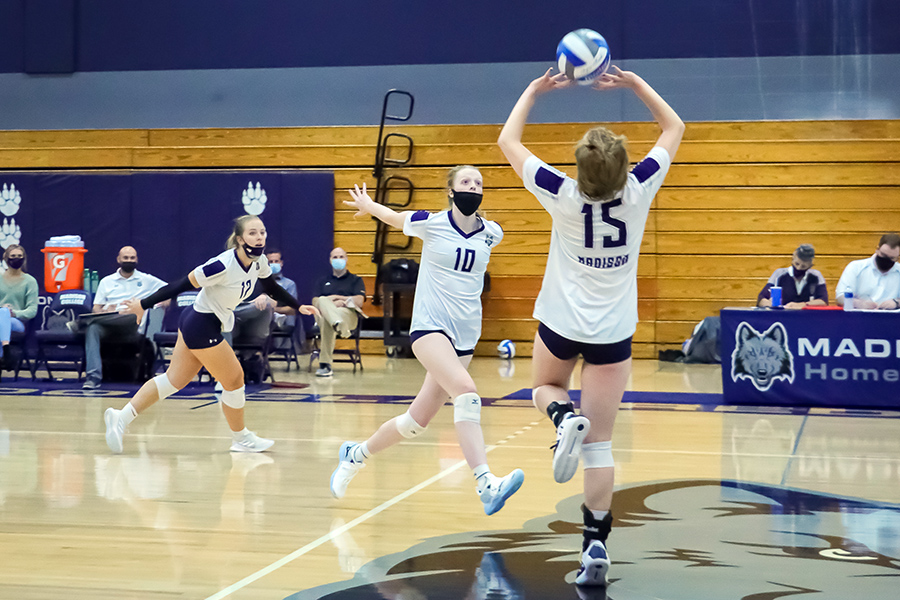 Madison College’s Kaleia Lawrence, right, sets middle blocker Calla Borchert on Oct. 5.