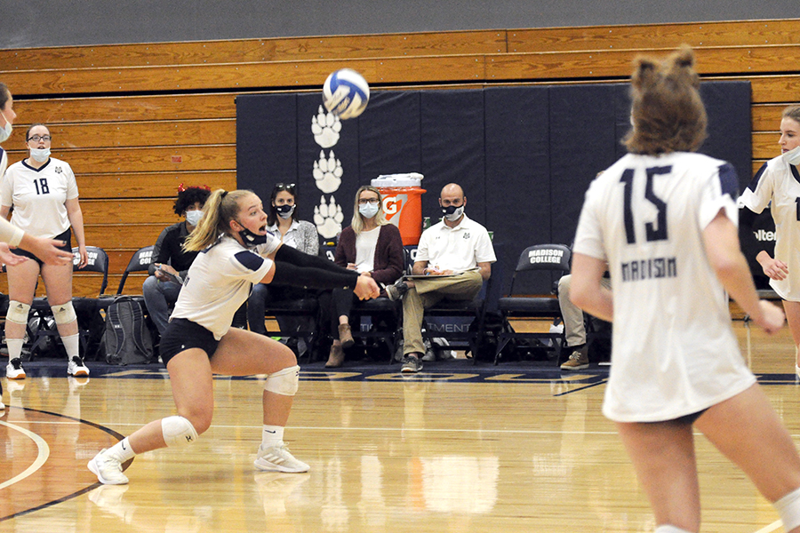Madison College's Amelia Walton receives a serve during her team's Region 4 Tournament Semifinal loss on Oct. 28, 2021.