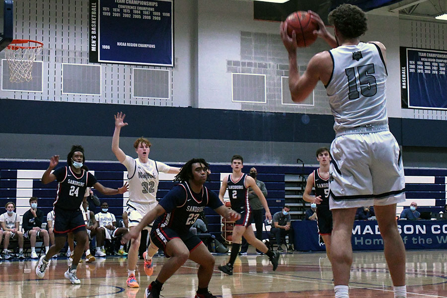 Madison College’s Keith Hoffman (15) looks to inbound the ball to Hayes Hensler (32) during a recent home game.