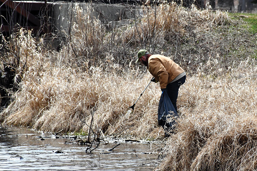 A student participates in the Warner Park clean up sponsored by the Volunteer Center, TRiO and RISE programs at Madison College. The event was held on Friday, April 15.