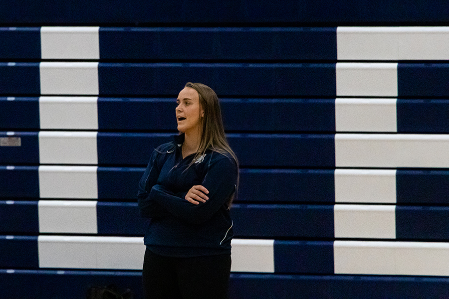 Madison College volleyball coach Mallory Stone watches her team compete on Aug. 24 in Redsten Gymnasium.
