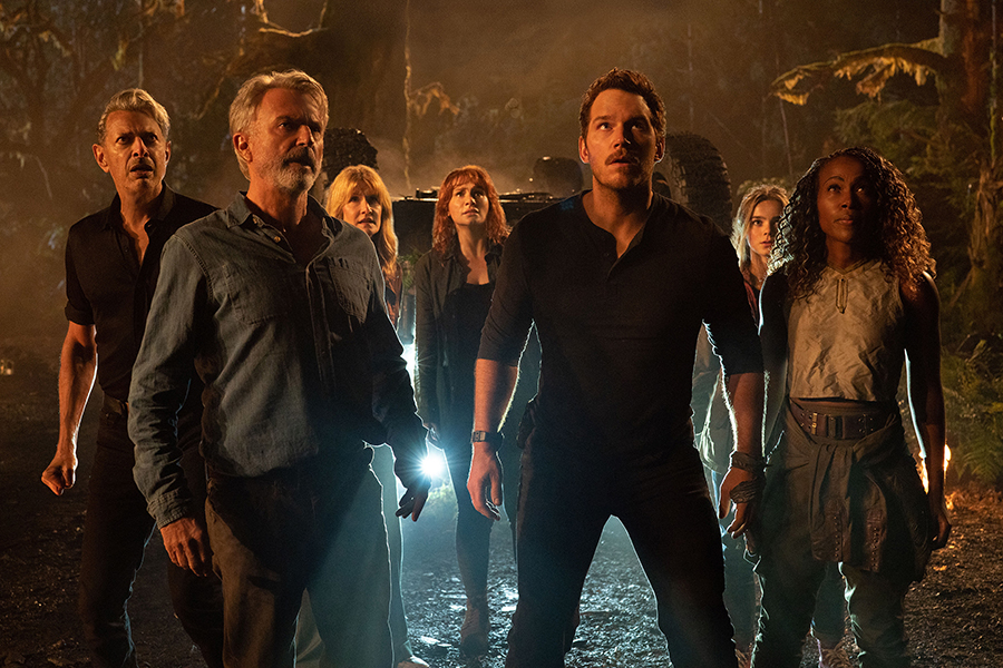 From left, Jeff Goldblum, Sam Neill, Laura Dern, Bryce Dallas Howard, Chris Pratt, Isabella Sermon and DeWanda Wise in Jurassic World Dominion.