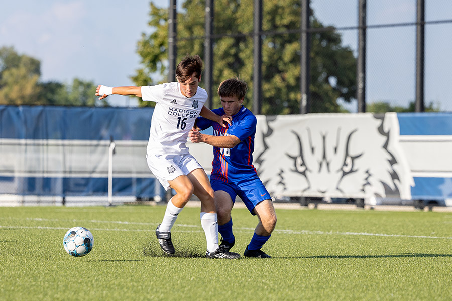 Madison College’s Gabe Voung battles for a ball at midfield against Milwaukee Area Technical College. Voung scored a career-high four goals to lead the WolfPack to a 9-0 victory.