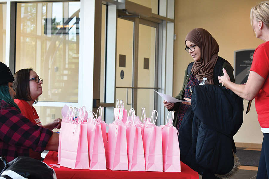 The+Madison+College+Peer+Health+Educators+gave+out+breast+cancer+screening+kits+on+Oct.+5+in+the+Madison+College+Health+Building+to+highlight+Breast+Cancer+Awareness+Month.