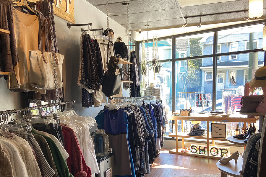 Clothes hang on racks at the Upshift Swap Shop in downtown Madison.