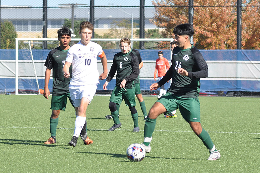 Madison Colleges Evan Thom tries to cut off a College of DuPage drive.