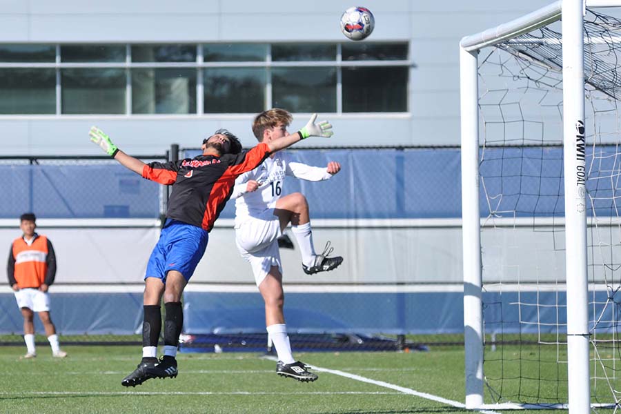 Madison College’s Gabe Voung, 16, heads a corner kick toward the goal against Milwaukee.
