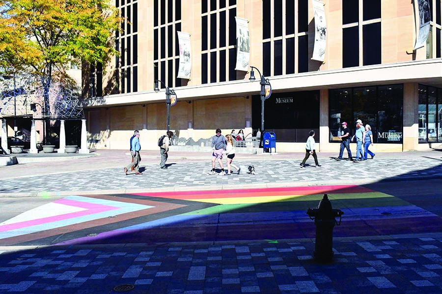 The newly installed Progress Flag is at the end of State Street near the Capitol Square in Madison.