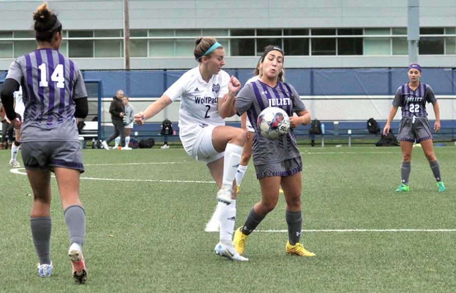 Madison College midfielder Taylor Peterson fights for control of the ball against Joliet Junior College on Oct. 12.