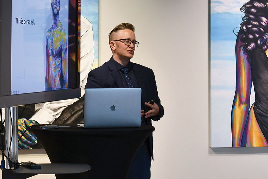 Rae Senarighi speaks at a gallery event at the Truax Campus in September.