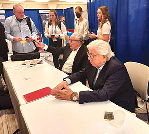 Bob Woodward and Carl Bernstein, right, meet, with students at the MediaFest22 convention.