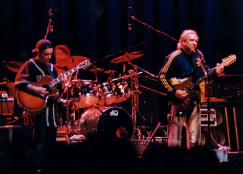 Instructor Todd Bowie performs on stage with Joe Walsh in 2000.