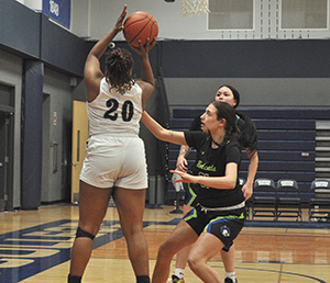Madison College’s Mikala Williams puts up a shot in her team’s loss against Bryant and Stratton on Jan. 10.