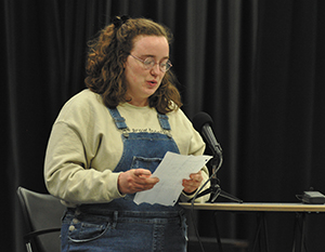 Taleise Lawrence reads during the Yahara Journal open mic in the Truax Campus Studio Theater on Feb. 21.