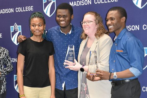 Members of the Executive Leadership Team celebrate being named Outstanding Student Organization of the Year. (Clarion Staff Photo)